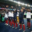 French players celebrate their win over South Korea in the opening game of the women's World Cup on Friday