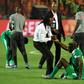 Senegal coach Aliou Cisse consoles defender Salif Sane after defeat in the final