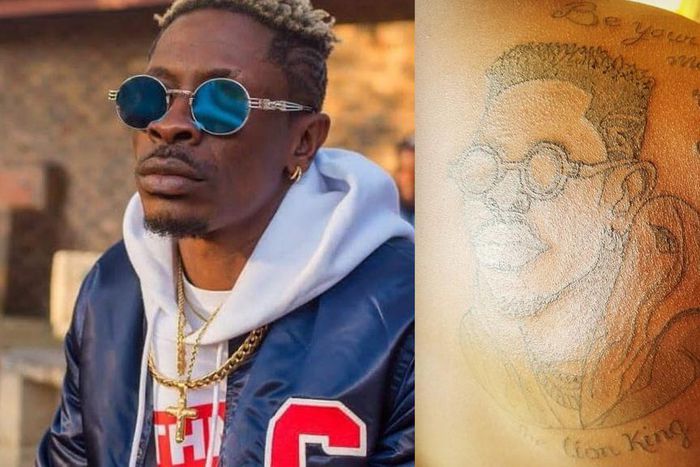 SM Fan tattoos Shatta Wale's face at his back