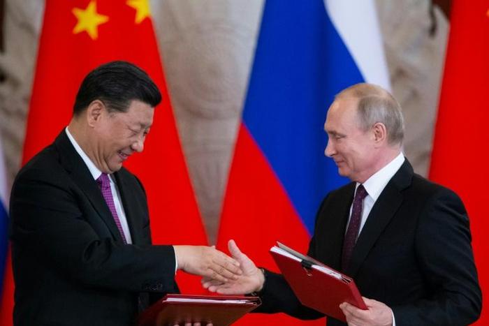 Chinese President Xi Jinping and Russian counterpart Vladimir Putin are putting up a united front