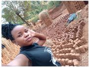 Pretty but deprived journalism student makes bricks to cater for her education