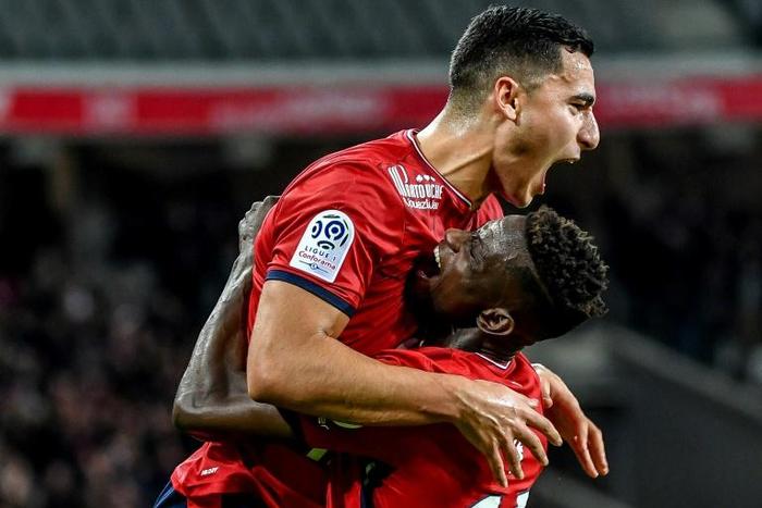 Netherlands international Anwar El Ghazi (left) has joined Premier League club Aston Villa on a permanent deal from Lille