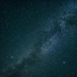 The Milky Way contains at least 100 billion stars and its centre contains an intense radio source believed to be the supermassive black hole Sagittarius A