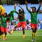 Cameroon players celebrate after Ajara Nchout's last-gasp goal saw them beat New Zealand to qualify for the last 16 of the women's World Cup on Thursday