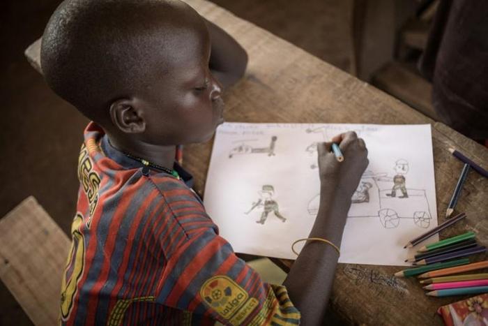 Children at the Lazare camp in Central African Republic are encouraged to draw as a form of therapy for post-traumatic stress disorder
