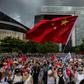 Sunday's rally was comprised of a noticeably older demographic, some waving Chinese flags
