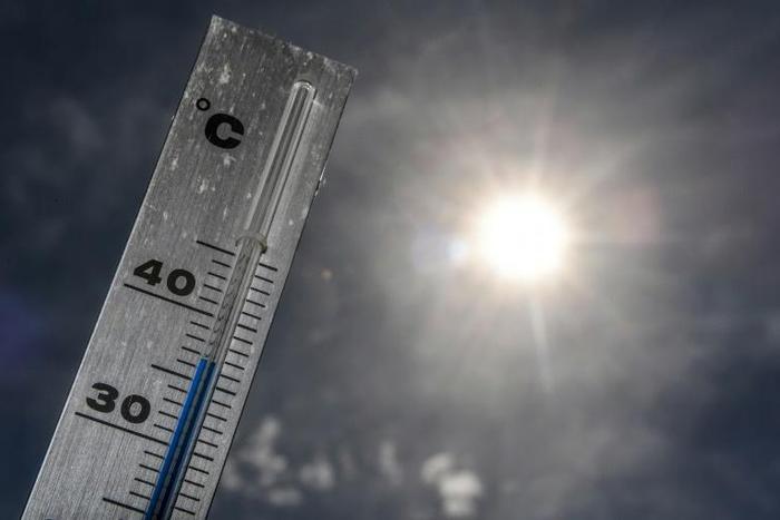A thermometer reaching almost 37 degrees Celsius in the northern French city of Godewaersvelde, near Lille, on Monday