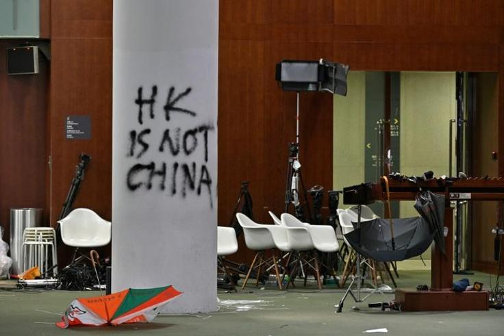 The protesters smashed their way into the former British colony's legislative building,prompting a diplomatic feud between Beijing and London