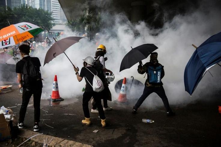 Hong Kong was rocked by the worst political violence since its 1997 handover to China on Wednesday as tens of thousands of protesters were dispersed by riot police firing tear gas and rubber bullets