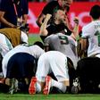 Algeria coach Djamel Belmadi (C) celebrates a win that put his team through to the Africa Cup of Nations final