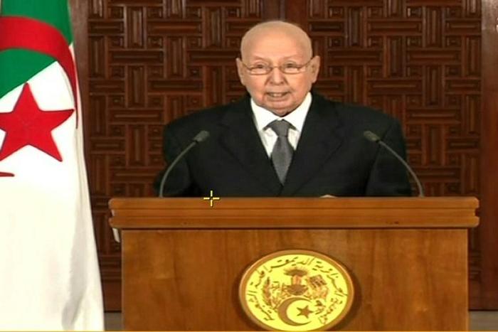 An image grab from the Algerian national television chanel on July 3, 2019, shows Algerian interim President Abdelkader Bensalah addressing the nation