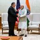 US Secretary of State Mike Pompeo shakes hands with Indian Prime Minister Narendra Modi during their meeting