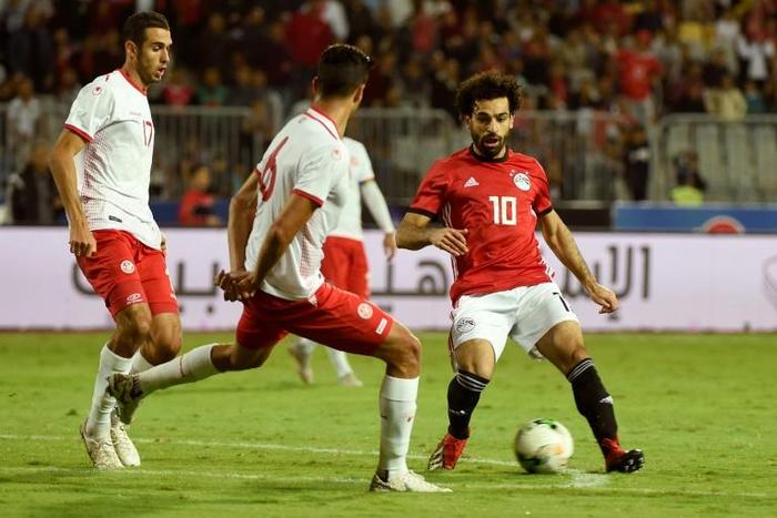 African superstar Mohamed Salah (R) playing for Egypt against Tunisia in a 2019 Africa Cup of Nations qualifier