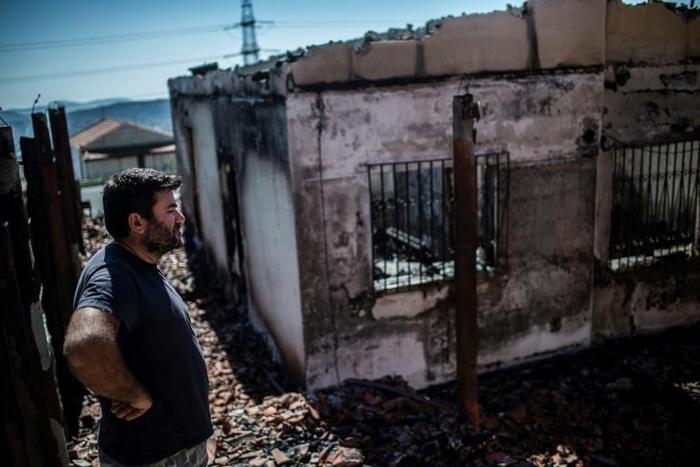 At least two houses were burned in a wild fire in the Athens suburb of Peania
