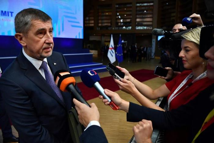 Czech Republic's Prime Minister Andrej Babis (L) is among populist politicians who have been critical of the media