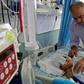 Yassir Shtewi sleeps each night by his son's bed in an Israeli hospital