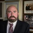Joseph Gutheinz Jr, a retired NASA special agent known as the "Moon Rock Hunter," in his law office in a Houston suburb