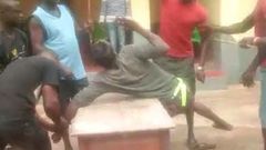 The young man captured being beaten for flouting the chief’s orders