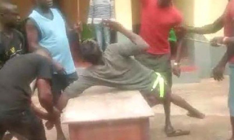 The young man captured being beaten for flouting the chief’s orders