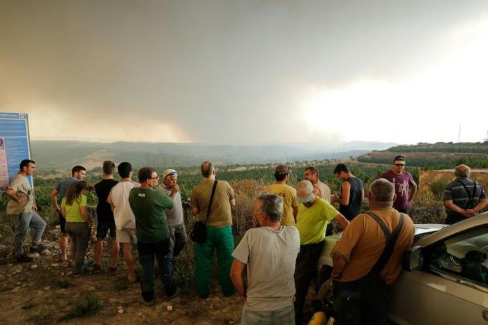 A massive blaze in Catalonia "could be controlled by this evening," the regional government said in a statement, adding that it would "take days" to fully extinguish it