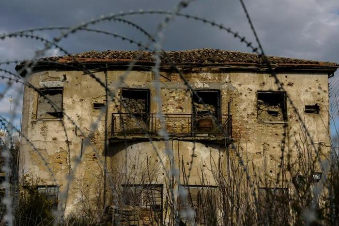 A building lies abandoned in the UN-patrolled buffer zone that has divided Cyprus since 1974, despite repeated reunification efforts by the world body