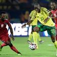 Mamelodi Sundowns captain Hlompho Kekana (C) playing for South Africa against Namibia this June during the Africa Cup of Nations in Egypt
