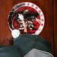 A protester daubs black paint over the Hong Kong emblem in parliament after breaking into the government headquarters