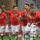 Chile players celebrate after defeating Colombia in a penalty shoot-out after a 0-0 draw in their Copa America quarter-final match in Sao Paulo, Brazil
