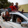 Convoys of vehicles honking horns took to the streets of Khartoum as Sudanese celebrated a hard-won deal between protest leaders and the ruling generals aimed at drawing the line under months of political unrest