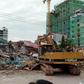 Dozens are feared buried in a building collapse in the Cambodian beachtown of Sihanoukville