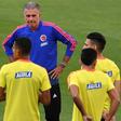 Colombia coach Carlos Queiroz speaks to his players