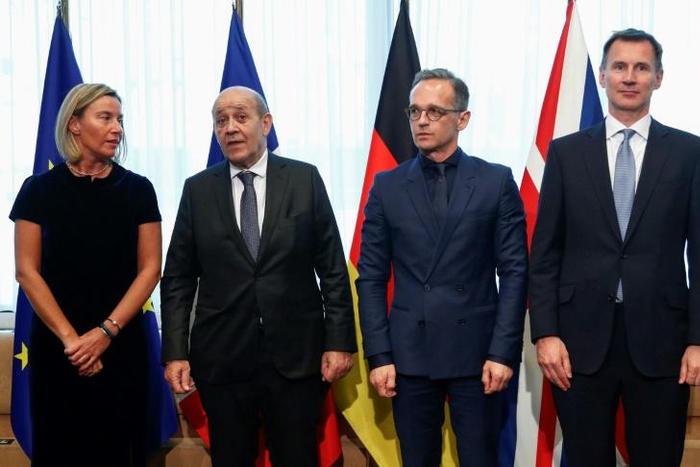 L-R: The diplomatic chiefs of the EU, France, Germany and Britain, pictured in May 2019, urged Iran to reverse its decision to breach a limit on enriched uranium reserves under a 2015 nuclear deal