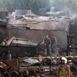 Pakistani soldiers cordon off the site where an aircraft crashed in Rawalpindi