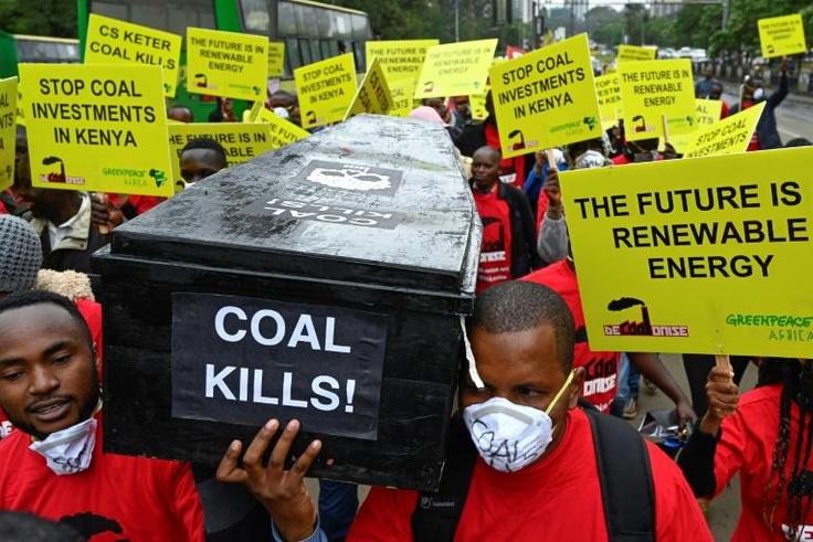 Protesters march in downtown Nairobi to demonstrate against a coal-fired power station planned for Kenya's heritage-listed Lamu archipelago