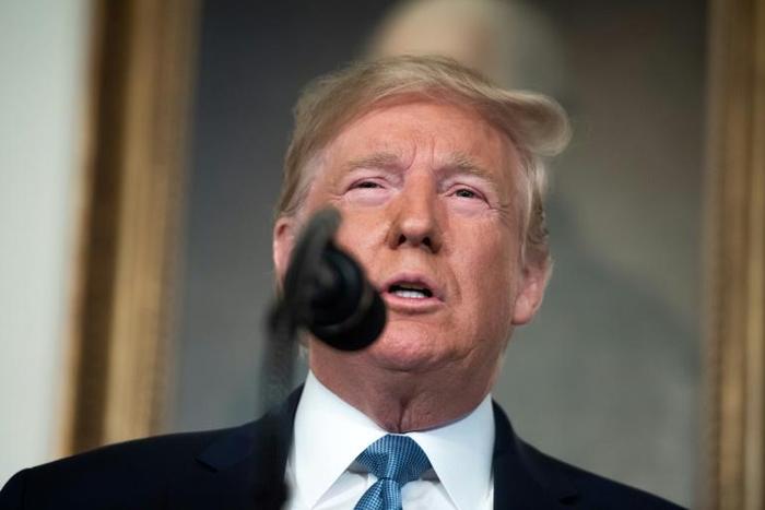 US President Donald Trump speaks about the mass shootings from the Diplomatic Reception Room of the White House in Washington, DC, August 5, 2019