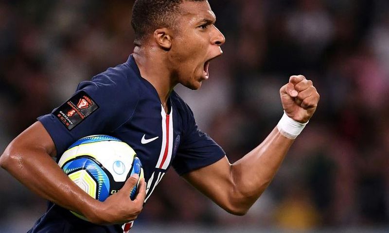 Paris Saint-Germain forward Kylian Mbappe celebrates scoring during the French Trophy of Champions match against Rennes