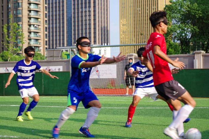 Sport is a rewarding break from the massage parlours for Jiangsu province's blind football team