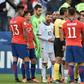Paraguayan referee Mario Diaz de Vivar is surrounded by players after showing the red card to Argentina's Lionel Messi and Chile's Gary Medel during the Copa America third-place play-off