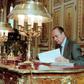 French President Jacques Chirac poses at his desk at the Elysee Palace in Paris in April 1996