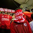 Hong Kong football fans have a history of covering their faces or booing during the Chinese national anthem