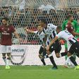 Udinese's Brazilian defender Rodrigo Becao (C) celebrates after scoring against AC Milan