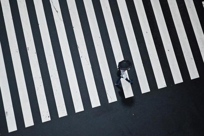 A Japanese firm has launched a gender equity campaign playing on common terminology labelling firms that mistreat employees "black" and those that treat workers well "white"