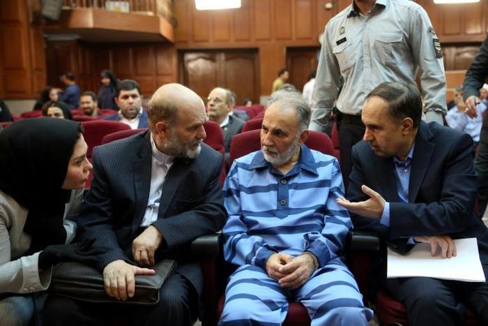 Mohammad Ali Najafi (C-R) appeared in a Tehran criminal court on Saturday, accused of shooting his second wife Mitra Ostad at their Tehran home