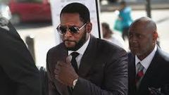 R. Kelly arrested on child pornography and other federal charges