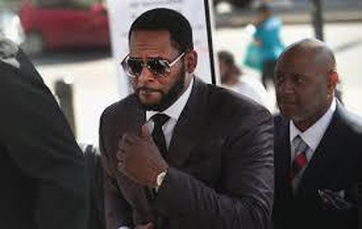 R. Kelly arrested on child pornography and other federal charges