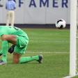 Liverpool's Simon Mignolet mishandles a shot from Sporting CP's Bruno Fernandes that leads to a goal in their pre-season friendly match at Yankee Stadium