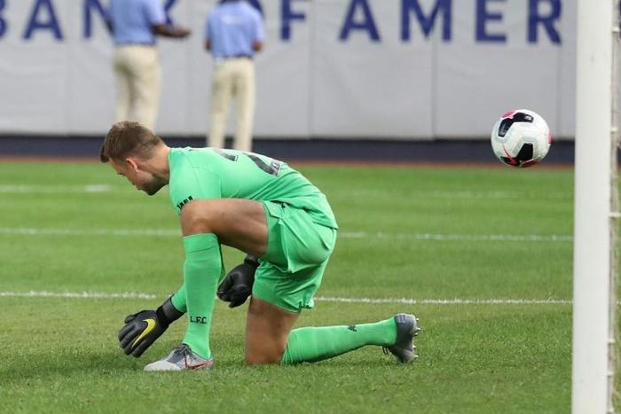 Liverpool's Simon Mignolet mishandles a shot from Sporting CP's Bruno Fernandes that leads to a goal in their pre-season friendly match at Yankee Stadium
