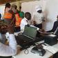 The officials were unhappy that the journalists were interviewing some frustrated applicants