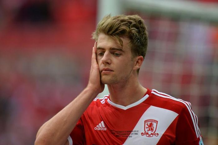 Former Middlesbrough forward Patrick Bamford scored a double in a 2-0 win over Wigan sending Leeds United top of the Championship on goal difference