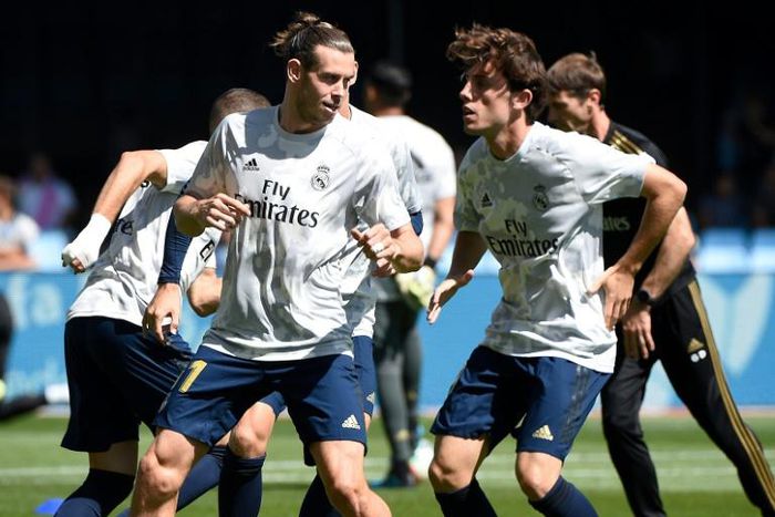 Gareth Bale warmed up with teammates on the pitch at the Balaidos Stadium in Vigo ahead of his surprise first start of the season